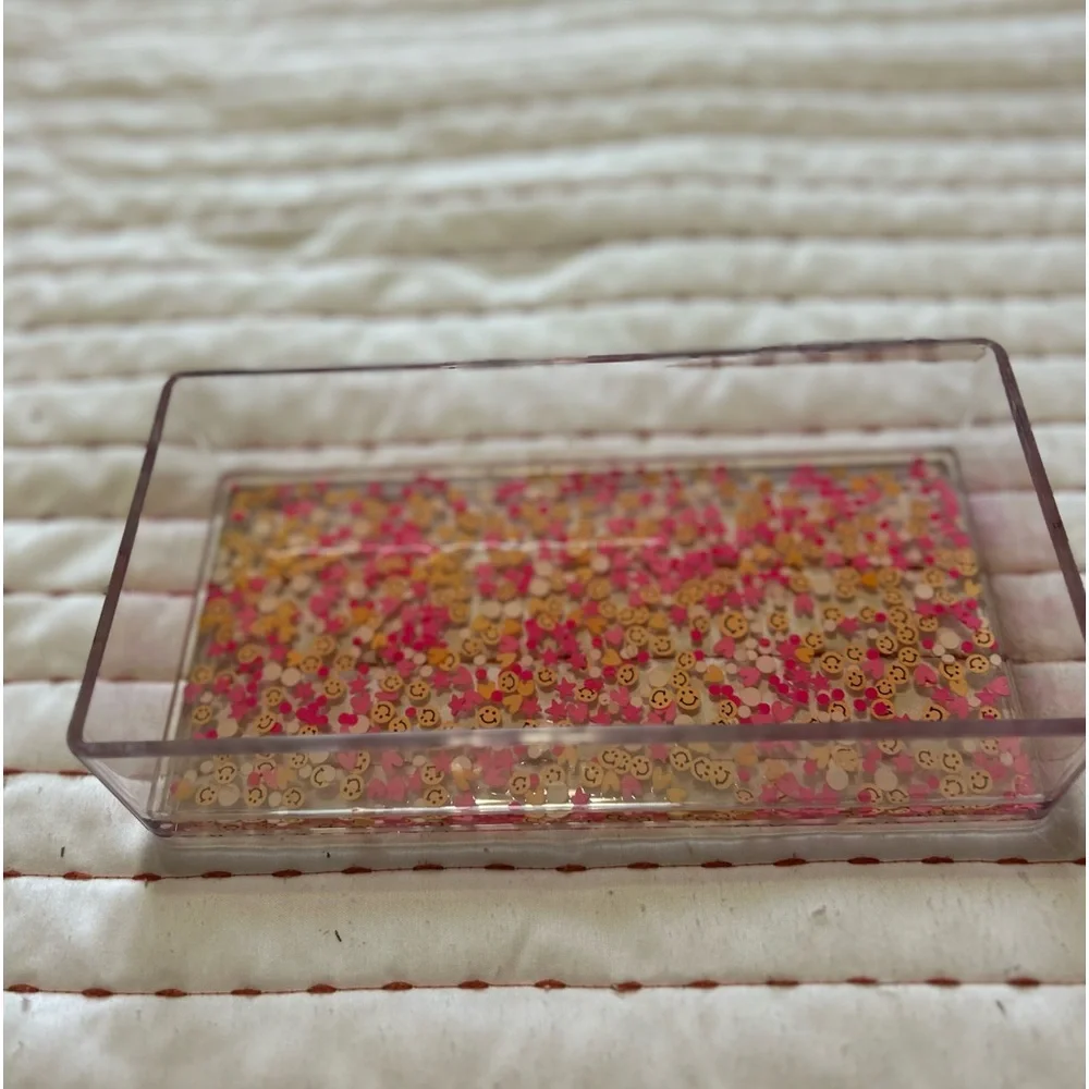 Acrylic tray from Etsy. Pink and orange detailing.